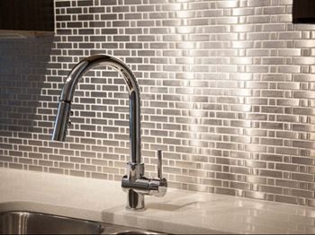 Metal mosaic stainless steel backsplash tile in kitchens